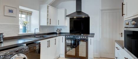 Oven, dishwasher, high chair, cookware/dishes/utensils