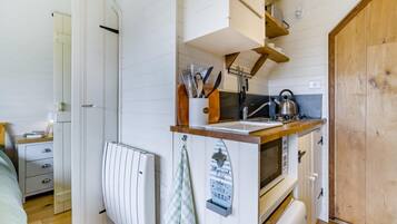 Microwave, oven, cookware/dishes/utensils