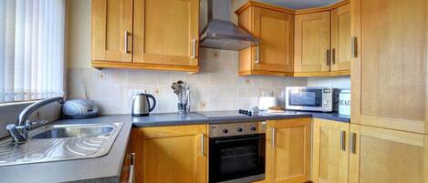 Microwave, oven, cookware/dishes/utensils