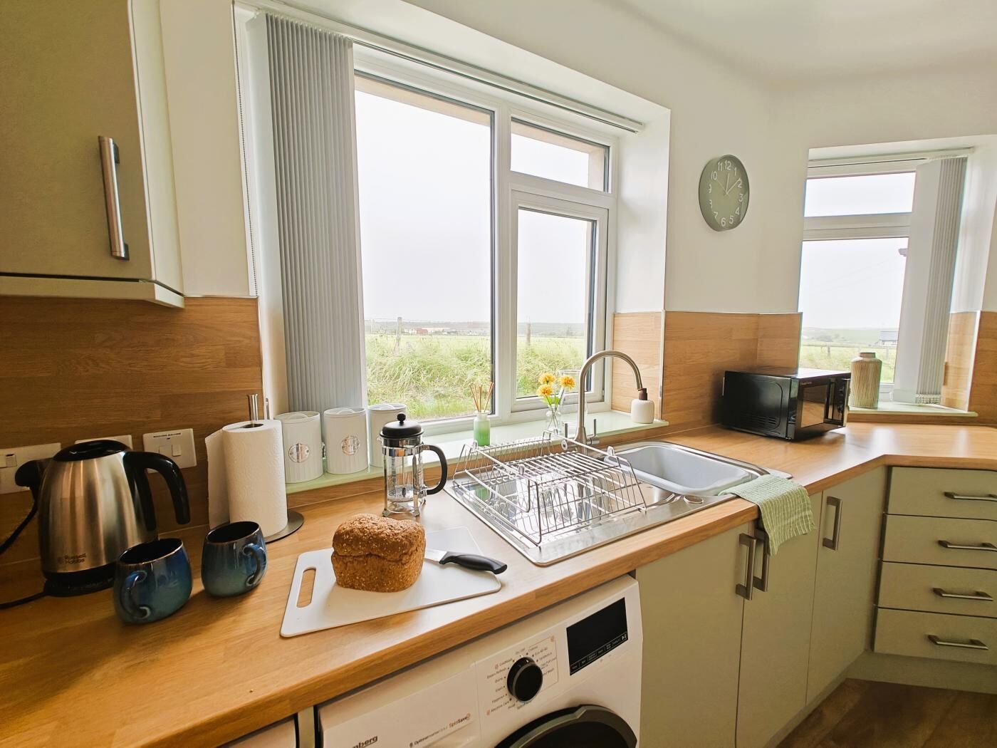 Microwave, oven, high chair, cookware/dishes/utensils