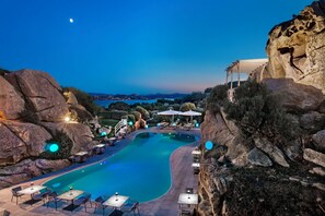 Indoor pool, seasonal outdoor pool, pool umbrellas, pool loungers