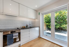 Microwave, oven, cookware/dishes/utensils