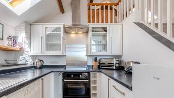 Microwave, oven, high chair, cookware/dishes/utensils