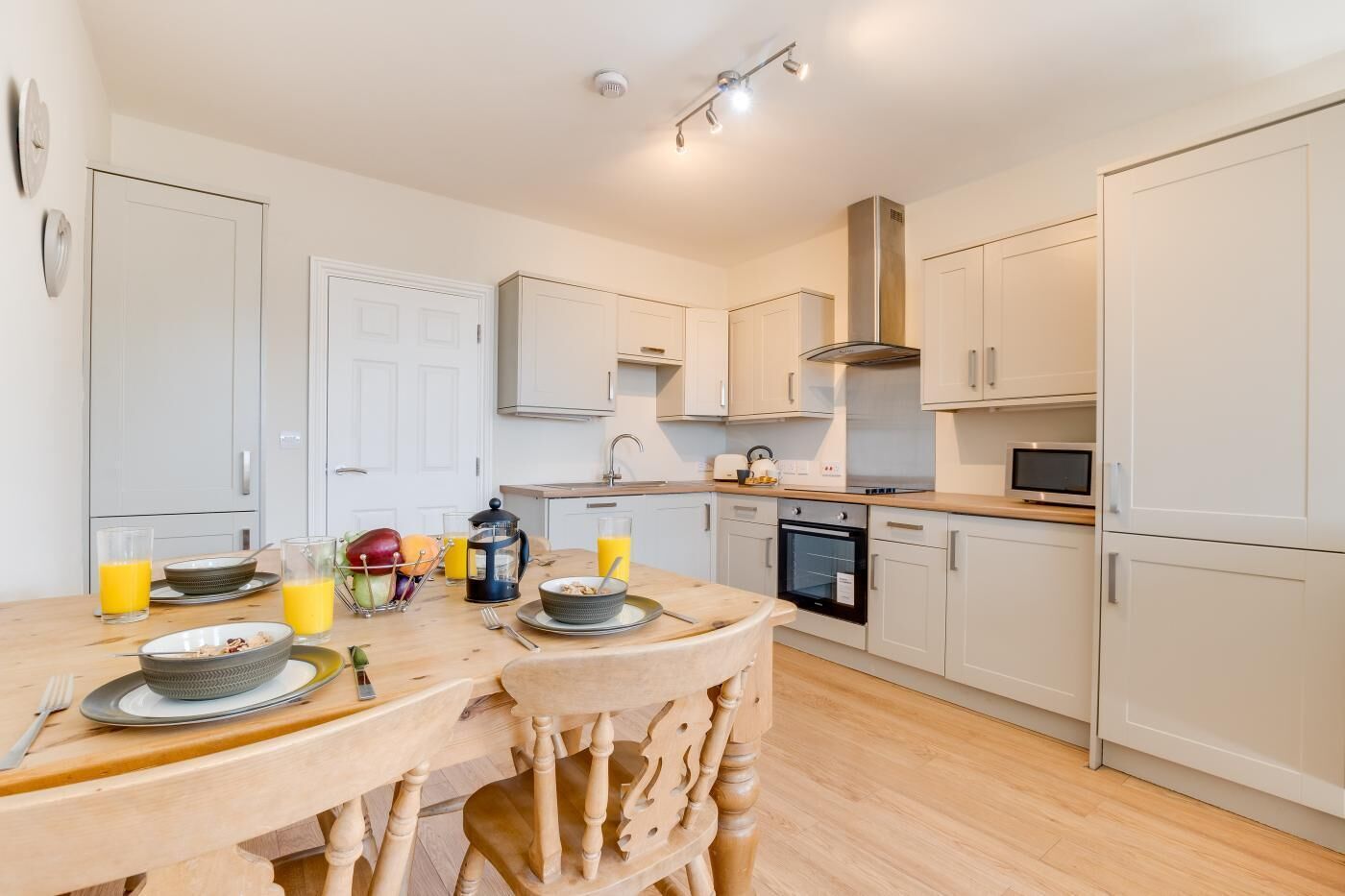 Oven, dishwasher, high chair, cookware/dishes/utensils