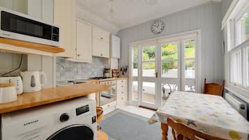 Microwave, oven, high chair, cookware/dishes/utensils