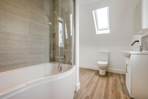 A modern bathroom with a glass-enclosed shower, a toilet, and a sink. - 3 Bed in Tintagel (oc-e32938) (Tintagel)