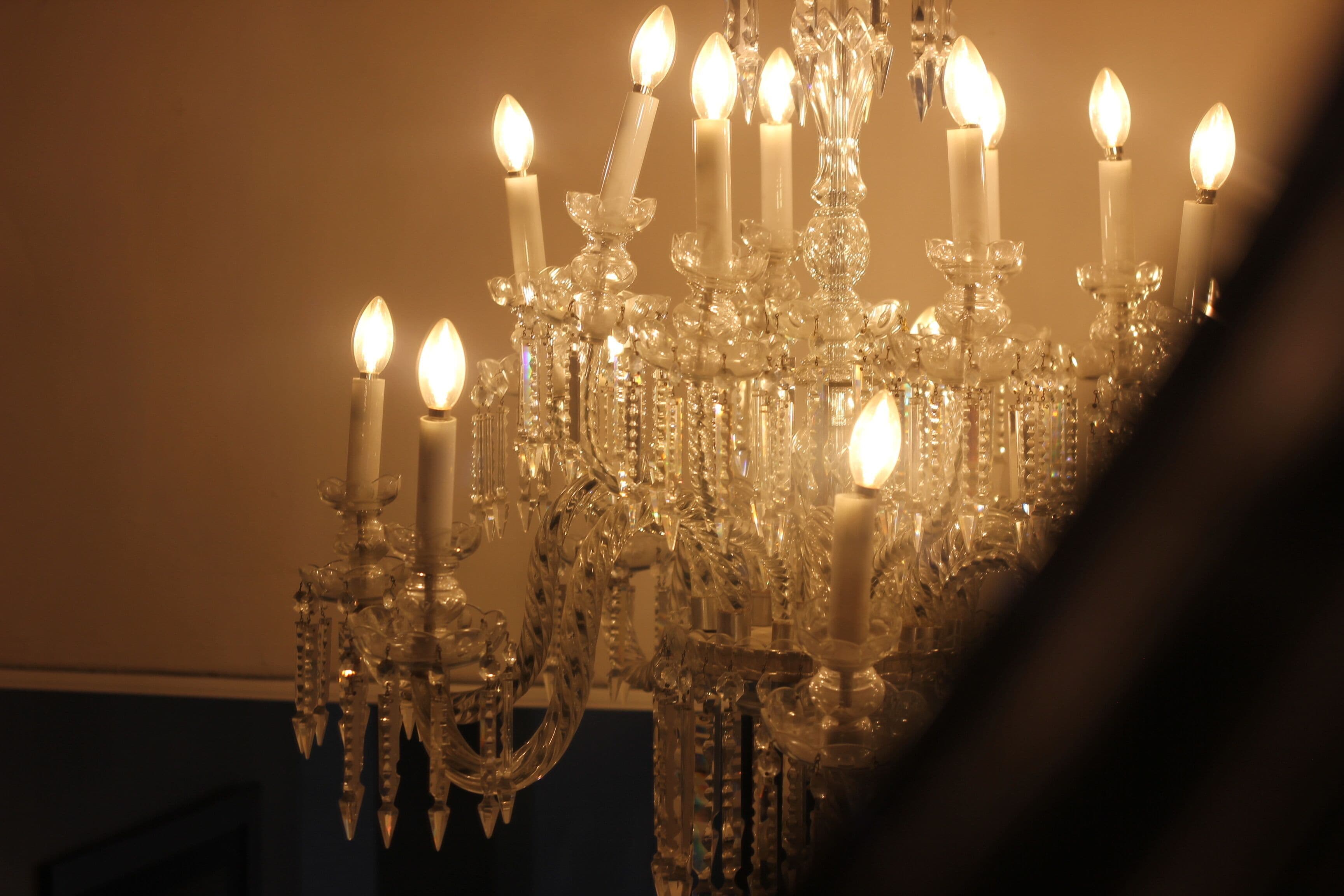 A chandelier with multiple candles.