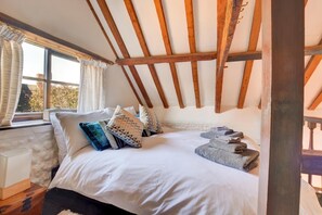 Tabla de planchar con plancha, wifi gratis, ropa de cama
