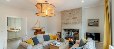 Televisor i llar de foc