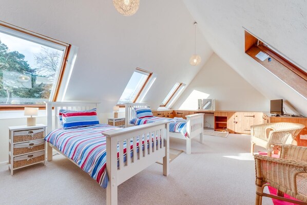 Tabla de planchar con plancha, wifi gratis y ropa de cama 