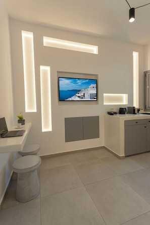 Deluxe Suite, Balcony, City View | Living area | Flat-screen TV