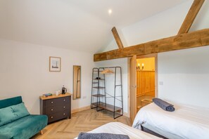 A bedroom with a bed, a dresser, a chair, and a ladder. - 2 Bed in Summerbridge (oc-o32940) (Hartwith cum Winsley)