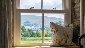 A window with a view of a green landscape and hills. - 3 Bed in Hardraw (oc-ds1029) (Appersett)