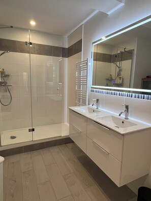 Shower, hair dryer, towels, soap