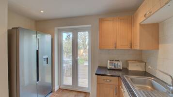 Microwave, oven, high chair, cookware/dishes/utensils