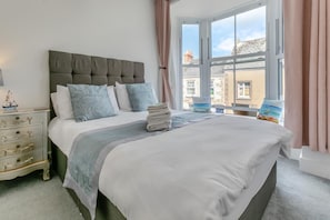 Iron/ironing board, travel crib, free WiFi, bed sheets