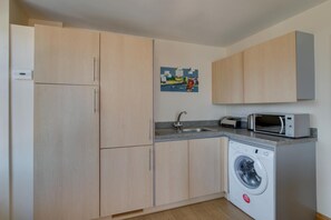 Oven, dishwasher, highchair, cookware/dishes/utensils