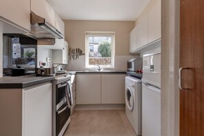 Microwave, oven, cookware/dishes/utensils