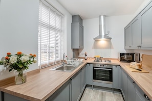 Microwave, oven, cookware/dishes/utensils