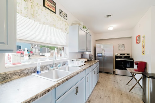 Little Red House with a vintage/retro feel to it. 3 bedrooms 2 full bathrooms