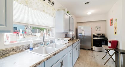 Little Red House with a vintage/retro feel to it. 3 bedrooms 2 full bathrooms