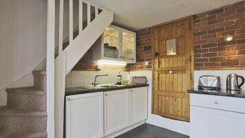 Microwave, oven, cookware/dishes/utensils