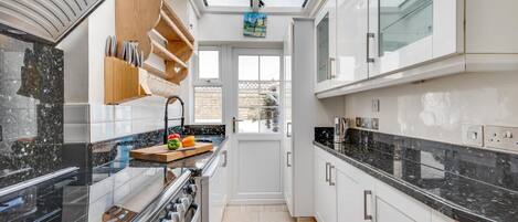 Microwave, oven, cookware/dishes/utensils