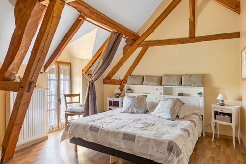 Chambre d’hôtes « Chambre Automne » avec jardin partagé et Wi-Fi