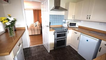 Microwave, oven, cookware/dishes/utensils