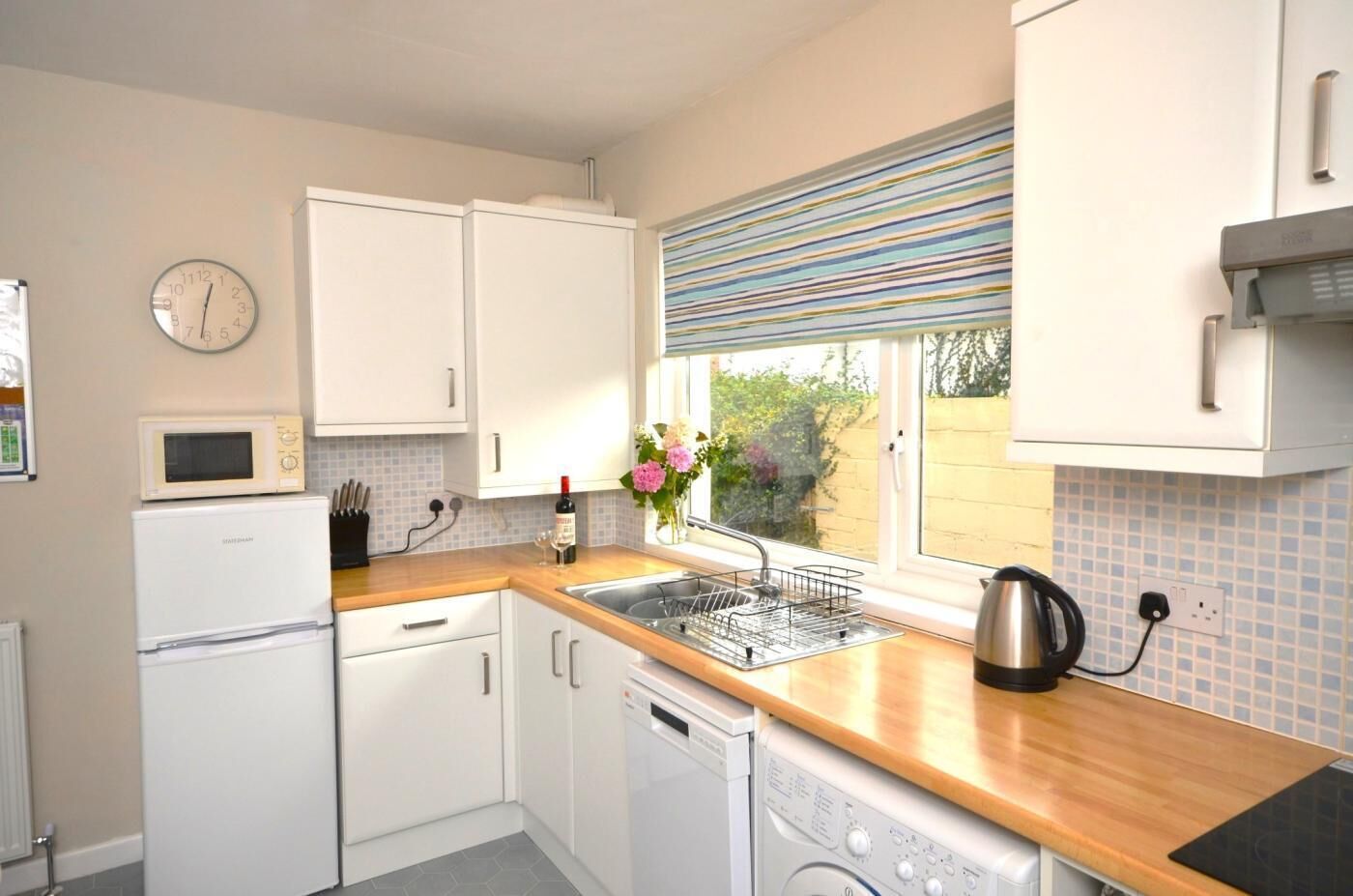 Microwave, oven, high chair, cookware/dishes/utensils