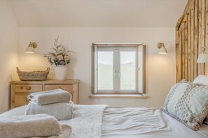 4 habitaciones, tabla de planchar con plancha y cuna de viaje 