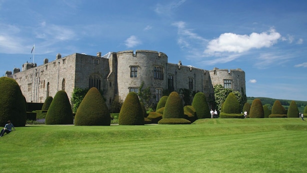 A historic stone castle with a well-manicured lawn and neatly trimmed topiary. - 2 Bed in Ruabon (oc-waf253) (Ruabon)