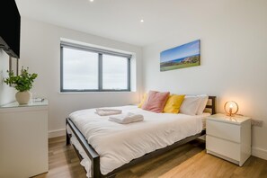 2 chambres, fer et planche à repasser, accès au Wi-Fi (inclus)