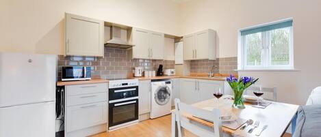 Microwave, oven, cookware/dishes/utensils