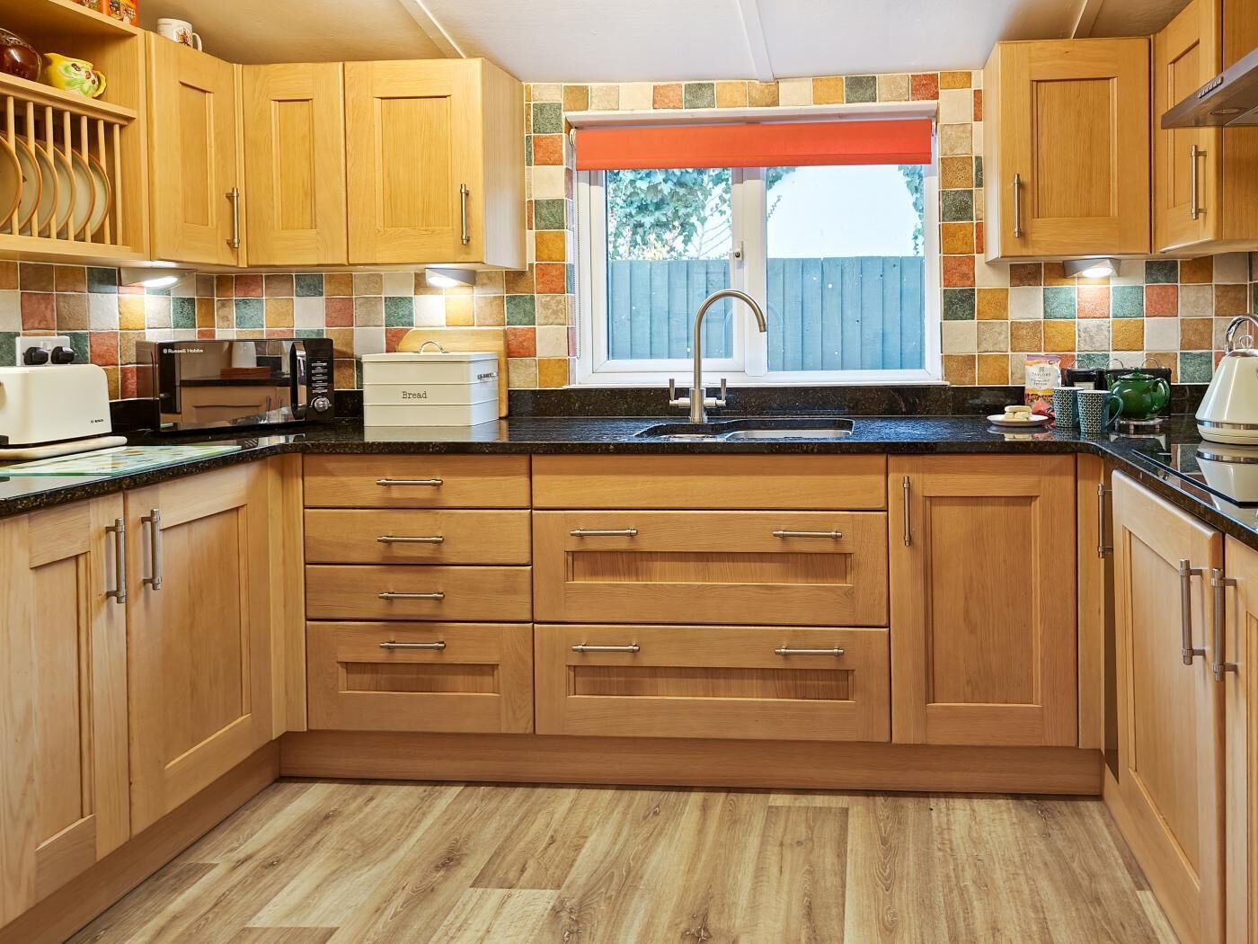 Microwave, oven, high chair, cookware/dishes/utensils