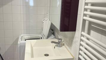 Ducha, secador de pelo