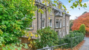 A historic stone building with multiple windows and a traditional design. - 3 Bed in Buxton (oc-c33947) (Buxton)