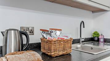 Microwave, oven, cookware/dishes/utensils