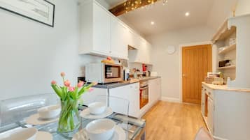 Microwave, oven, high chair, cookware/dishes/utensils