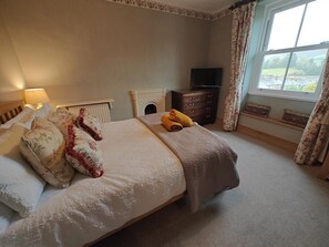 Iron/ironing board, travel crib, free WiFi, bed sheets