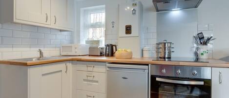 Microwave, oven, cookware/dishes/utensils