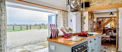 Oven, dishwasher, high chair, cookware/dishes/utensils