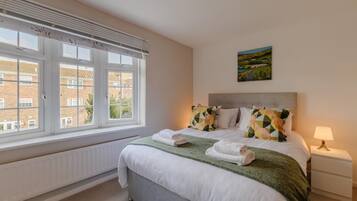 Iron/ironing board, travel crib, free WiFi, bed sheets