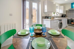 Microwave, oven, high chair, cookware/dishes/utensils