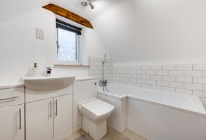 Séchoir à cheveux, serviettes fournies