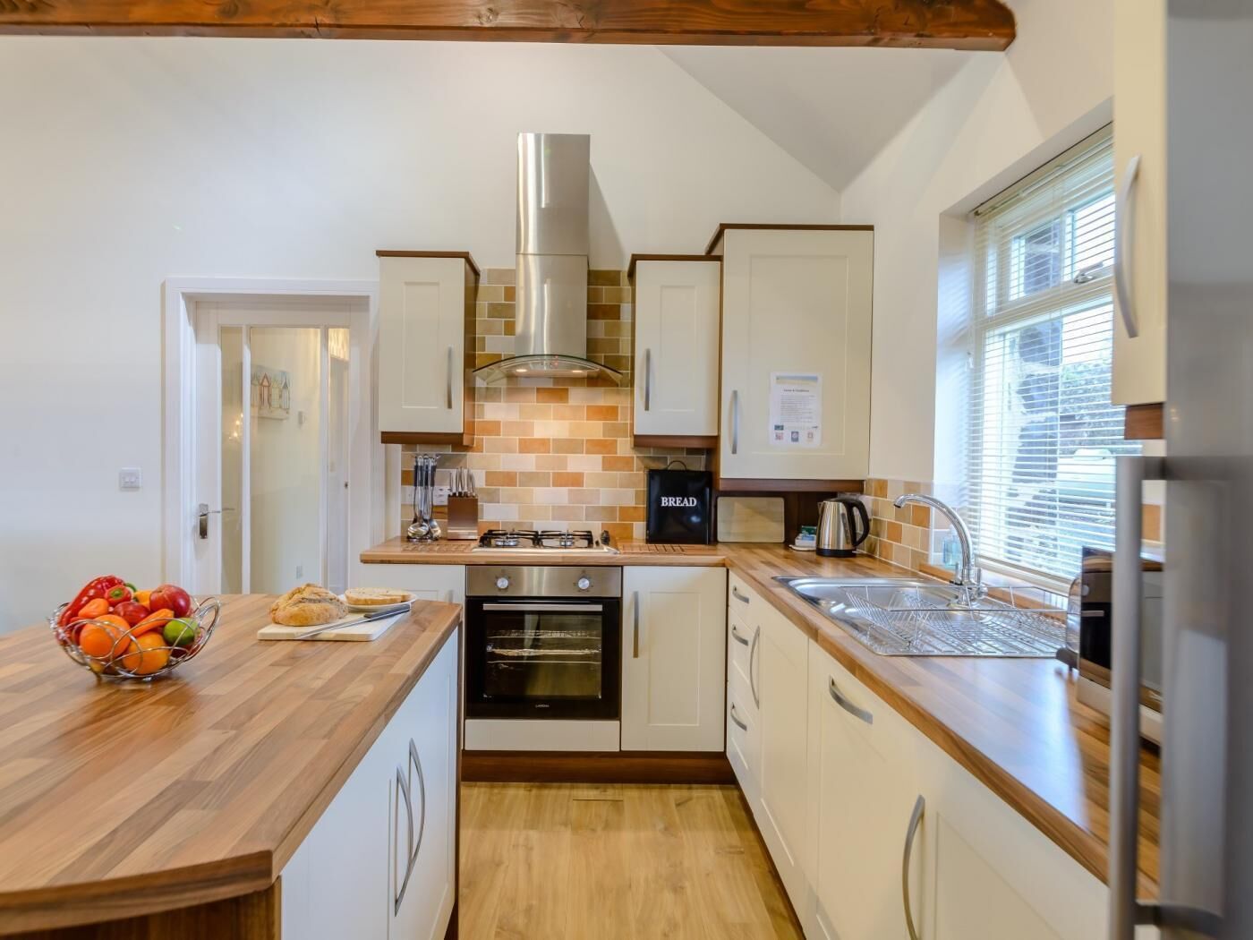 Oven, dishwasher, high chair, cookware/dishes/utensils