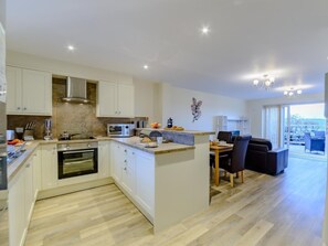 Oven, dishwasher, highchair, cookware/dishes/utensils