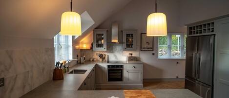 Oven, dishwasher, high chair, cookware/dishes/utensils