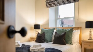 2 dormitorios, tabla de planchar con plancha, wifi gratis y ropa de cama