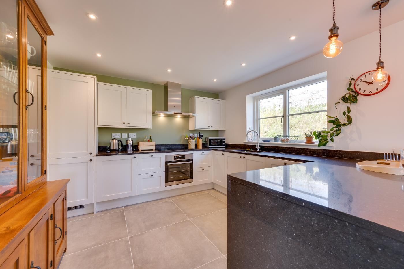 Oven, dishwasher, high chair, cookware/dishes/utensils